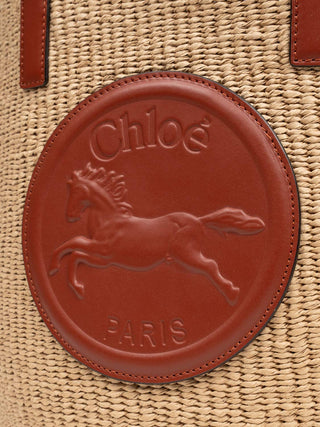 Raffia-Korb mit Lederbesatz