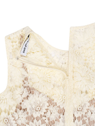 Gelbes Minikleid aus feiner Spitze