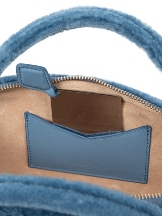 Le Teckel aus geschorenem Shearling in Blau