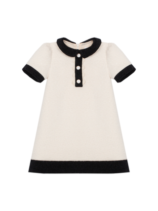Beiges Kleid mit schwarzen Details