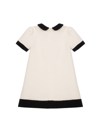 Beiges Kleid mit schwarzen Details