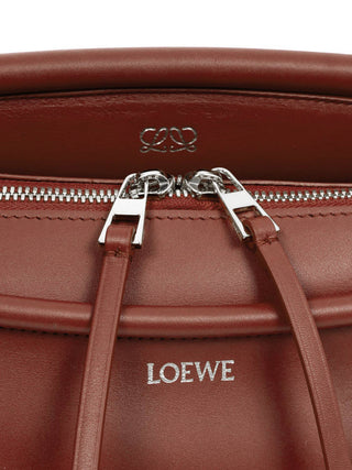 Kleine Whisker Tasche aus glasiertem Kalbsleder in Cognac
